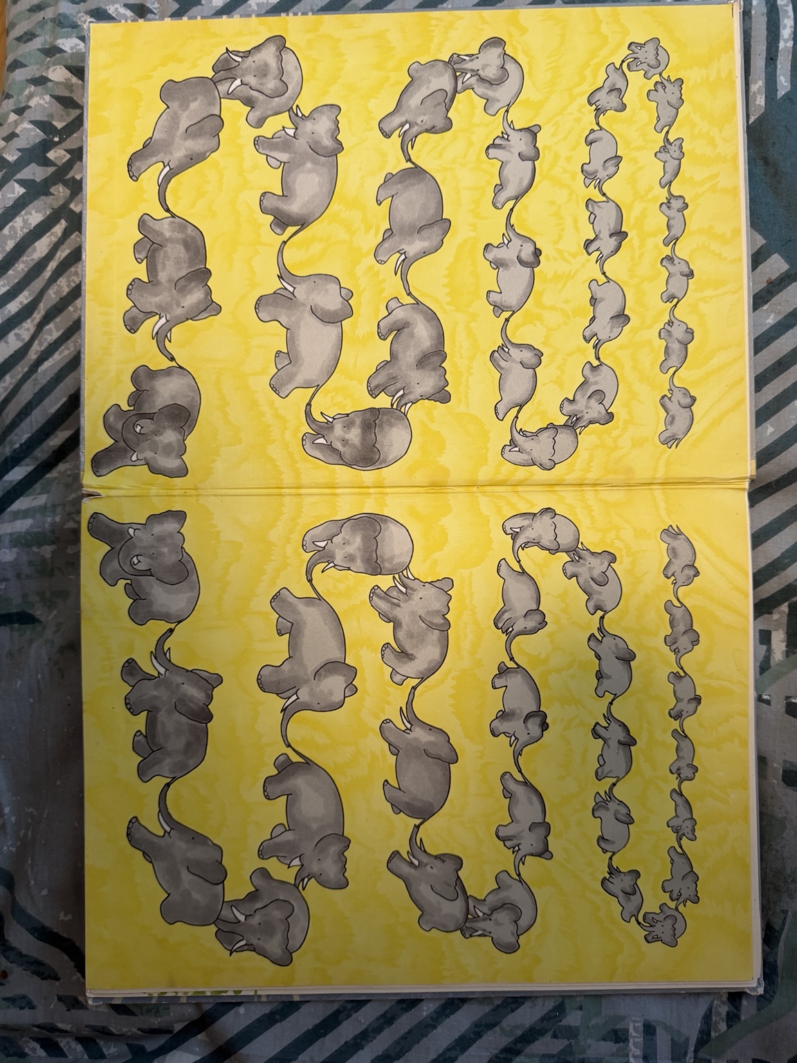 Yellow elephant-pattern endpapers